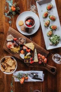 Event Styled Shoot AirBnB Flat lay of food, including a charcuterie board. Wedding planned by luxury Asheville wedding planner Terran Ward
