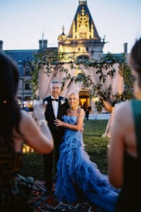 Biltmore Weddings – Marcos and Gaby Couple poses for a photo during evening wedding at the Biltmore Estate.
