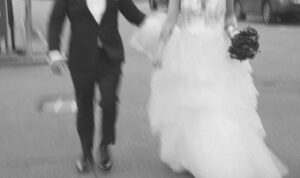 Grand Bohemian Asheville Wedding_Carly and David Blurry black and white photo of couple walking together at the Grand Bohemian Asheville. Wedding Planned by luxury Asheville Planner Terran Ward