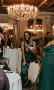 Daniela and Angelo Wedding Grand Bohemian Asheville Wedding guests mingling at the reception in the ballroom. Wedding Planned by Terran Ward at The Grand Bohemian Asheville