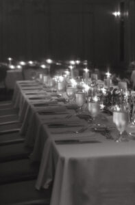 Daniela and Angelo Wedding Grand Bohemian Asheville Black and white photo of a long reception table set up. Wedding Planned by Terran Ward at The Grand Bohemian Asheville