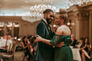 Daniela and Angelo Wedding Grand Bohemian Asheville Groom dancing with family member in the ballroom. Wedding Planned by Terran Ward at The Grand Bohemian Asheville