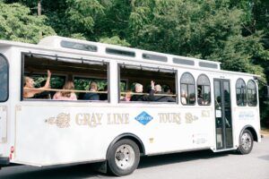 Tour bus with wedding guests inside. Asheville wedding planner Terran Ward creating luxury weddings with a budget.